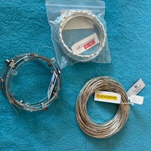 3 Silver Toned Bracelets